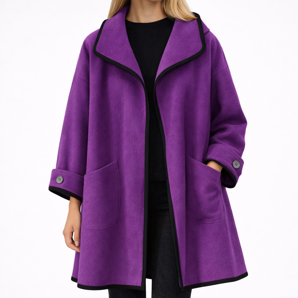 Abrigo de lana estructurado con ribetes en contraste y silueta definida