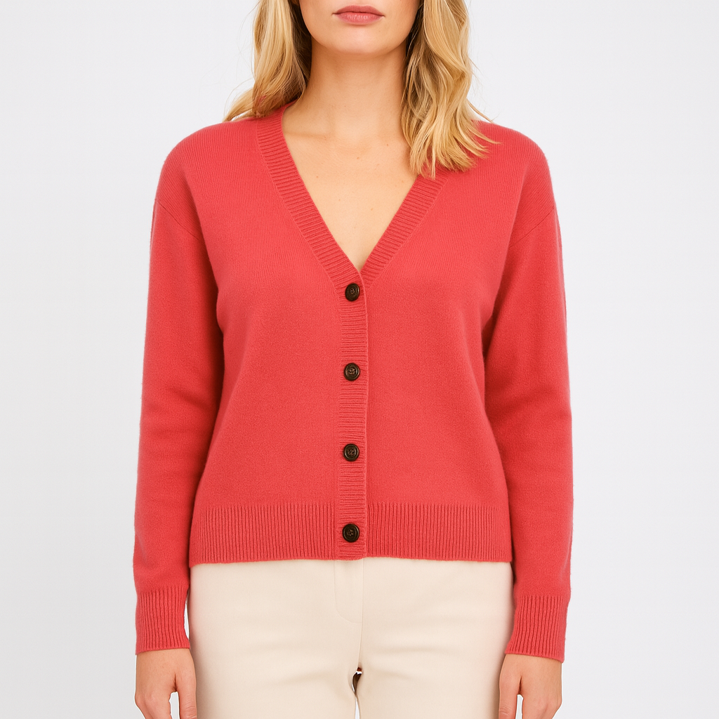 Cárdigan de punto con cuello en V, cierre de botones y mangas largas.